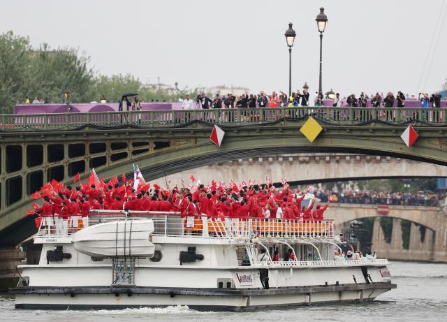 买马挣钱网站app-【图集】中国体育代表团正式亮相 马龙挥舞五星红旗